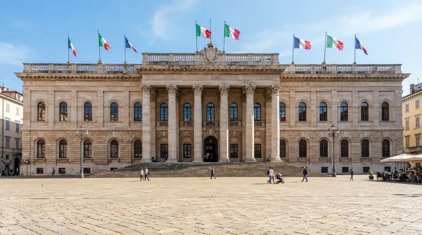 Palazzo istituzionale con bandiere al vento in una piazza soleggiata — casino online con soldi finti